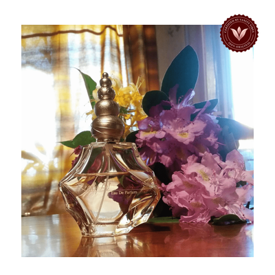 Rasasi Beauty Art 75ML EDP bottle with floral background