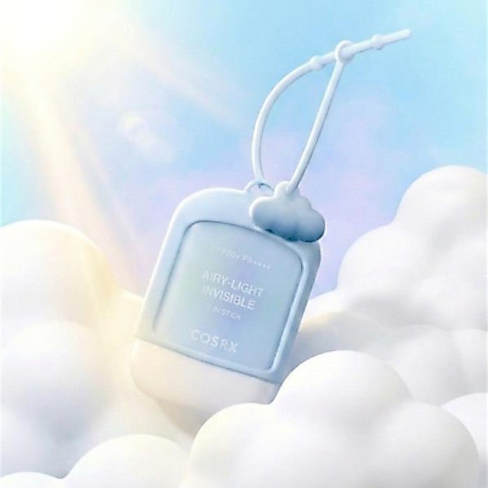 COSRX Airy-Light Sun Stick and included cloud keyring
