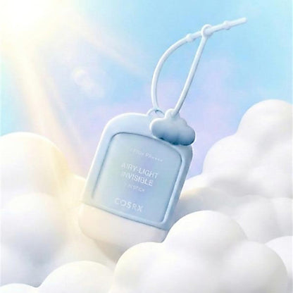 COSRX Airy-Light Sun Stick and included cloud keyring